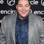 Max Talisman Instagram - Encircle’s Queer Holiday Party 🎁🏳️‍🌈 Styling by @styledbyambika Grooming by @robertti Shirt by @robertgrahamnyc Jacket by @johnnybiggusa Haircut & Styling by @hairbyrmz and @southpawlosangeles E.P & L.P