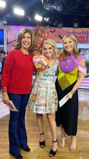 Meaghan B. Murphy Instagram - I thought we could all use some GOOD NEWS, 🗞️ so I decided to BE good news for Halloween!!! Like literally. In a DIY newspaper dress made out of happy headlines.📰⚡️🔋

Check out this epic upcycled dress covered in happy headlines, plus a little punny business, sports icons & totally ‘80s fun! Which costume is your favorite?!

And now my Oscar speech, because this 4 minutes of television took a lifetime to pull off!

👏🏼Big HUGE thanks & YAY to:

📺 Producer extraordinaire @sclagett who knows I love a challenge
🎨Artist @michelesobel_fineart who is the creative genius (and Ghost Writer!) who made this all possible
💪🏽The literal good sports at @alphafitclub.shorthills 
📼My “I Heart the ‘80s” crew who definitely never made a mix tape with the exception of Pac-Mom
💋Makeup magic by @sarahjeanne81 
💈Redic glitter hair (and moral support) from @reelstyle_beauty 

Now I’m ready for Christmas!

#halloween #halloweencostumes #todayshow #pacman #80s #messi #aaronrodgers #cocogauff #mspacman #rubikscube #mixtape