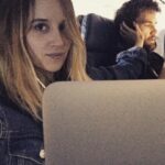 Megan Park Instagram - He has no idea I took this but the fact that we've been silently working next to each other on this airplane for 3 hours but he looks over and smiles at me every few mins is making my heart explode 😍🤓😍