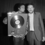 Michael Jackson Instagram – Michael in London, UK in 1980 accepting a gold disc for The Jacksons’ ‘Triumph’ album. The album features “This Place Hotel”’ which was written solely by Michael, and he leads the song on vocals.