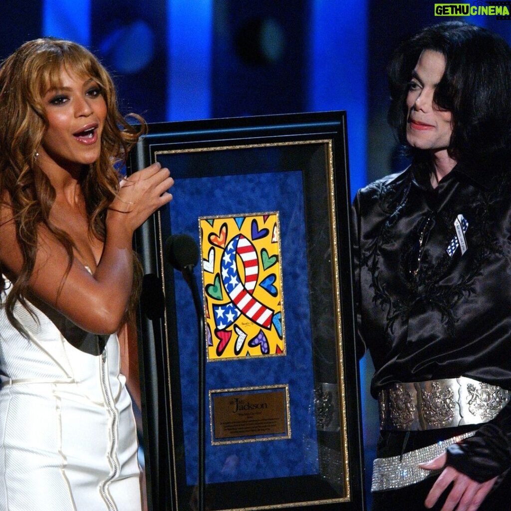 Michael Jackson Instagram - On this date in 2003, Beyoncé presented Michael Jackson with the Radio Music Awards’ Humanitarian Award. The event was held at the Aladdin Casino & Resort in Las Vegas. #MJHumanitarian