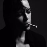 Michelle Rodriguez Instagram - Why are unhealthy cigarette shots reminding me of how sexy Paris is? Talk about decades of propaganda still love those old Hollywood shots of Brando Marlene James Dean & McQueen with a stogie in their mouth