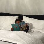 Mike Epps Instagram - I don’t know what my 2 year old son is reading but it must be good 😊 😂