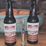 Mike Vogel Instagram - Perfect ending to a great day at the range. Favorite beer, favorite beer tool..... @lazymagnoliabrewery @bottlebreacher