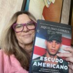 Mo Collins Instagram - I was so amped up about meeting this hero last night that I accidentally grabbed a Spanish version of his book. 😂 This man understands the dangers and importance of the phrase “boots on the ground” when it comes to defending our democracy. @gonell111 did exactly that on January 6 at the capitol. Met him at the launch party for @nrjmediagroup , whom are all primed and ready to bring great projects to light!! Congratulations to this electric bunch!! #j6 #sgtgonell #nrjmediagroup #contentcreator