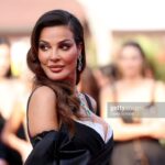 Nadine Njeim Instagram - I have always been fascinated by the glamour of the 50s era. The era of Brigitte Bardot and Sofia Loren.… You know, I love how back then, women embraced their curves, fashion was bold, yet feminine… And here we are today… Zuhair and I decided to create a custom made dress inspired by this golden Era and this magical city… Cannes… Thank you for every person who made this vision come to life… Thank you @chopard for hosting me 🤍🖤