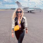 Natalie Stovall Instagram - 🏁 Bristol Baby!! 🏁 When I was little, my big brother, Joe, would have his friends over every weekend for the @nascar races. And inevitably, when a break would happen, there was always a “Natalie! Go get your fiddle!” So I’d play a few songs and feel like the coolest kid around. Fast forward to this past weekend, I attended my very first race, in the “coolest kid” way possible… (thank you @quartzhillrecords 🤍🥂) and I found myself again playing that fiddle, as us ladies did a little acoustic set for some VIP’s. It was so much fun cheering for @tyler_reddick and getting to soak it all in! What an experience!!! Swipe to the end to see Joe-Bob and little me. Bristol Motor Speedway