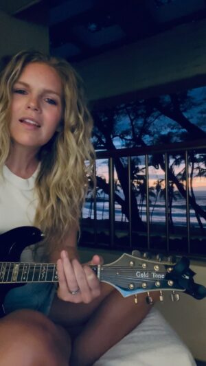 Natalie Stovall Instagram - ✨ Mr. Sandman ✨ Was completely inspired taking in this magical sunset and just messing around on my mando. Suddenly @symlmusic version of Sandman started running through my head, so I had to get it out. #moodybeach #mrsandman #cover #sunset #mandolin #goldtone #beach #Hawaii
