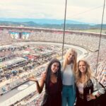 Natalie Stovall Instagram - 🏁 Bristol Baby!! 🏁 When I was little, my big brother, Joe, would have his friends over every weekend for the @nascar races. And inevitably, when a break would happen, there was always a “Natalie! Go get your fiddle!” So I’d play a few songs and feel like the coolest kid around. Fast forward to this past weekend, I attended my very first race, in the “coolest kid” way possible… (thank you @quartzhillrecords 🤍🥂) and I found myself again playing that fiddle, as us ladies did a little acoustic set for some VIP’s. It was so much fun cheering for @tyler_reddick and getting to soak it all in! What an experience!!! Swipe to the end to see Joe-Bob and little me. Bristol Motor Speedway