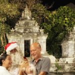 Nia Dinata Instagram – Christmast at the Temple..with Javanese Santa❤️💚 and Quarantini is a bit affraid of mbah Santa🙏🏼🌲sending love from Jogja to all over😇🙏🏼 #christmas2023 #loveandlight #mbahsanta #niamaste Candi Tirto Raharjo