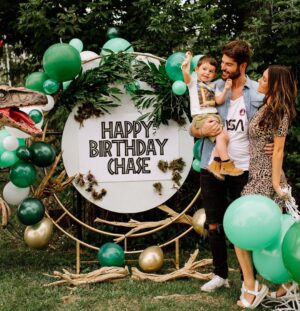Nick Bateman Instagram - THE BIG TWO! HAPPY BIRTHDAY to my lil man ❤️ Love you son 

•
•
Big thank you to;
Florals, Decor & Planning: @openingnflowers 
DIY Terrarium Bar: @Bloomservice.co
Photography: @Lcoulterphoto
Furniture: @special_event_rentals
Place Settings: @Tabletalesto
Cake: @pastrybynikki 
Dinos: @Indianriverreptile 
for making CHASES 2nd BIRTHDAY party unforgettable