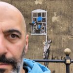 Nima Akbarpour Instagram - Well Hung Lover, also called Naked Man Hanging From Window is a mural by the anonymous street artist #Banksy, on a wall in Frogmore Street, #Bristol, #England. Banksy - Well Hung Lover
