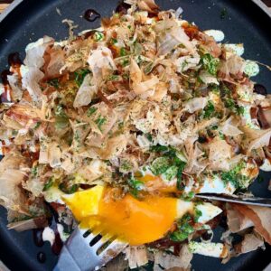 Nobi Nakanishi Instagram - It's official. Right now the finest okonomiyaki is at @hereslookingatyoula and you would be remiss not to order it as part your boozy brunch. #umami #okonomiyaki #oishii