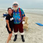 Norah Casey Instagram - I believe 😊 - tropical Santa chillin on the beach #letitsnowsomewhereelse☀️ #thisonesakeeper @visitnewsmyrnabeach #christmasiscomingtotown 🎄 New Smyrna Beach, Florida
