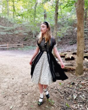 Olive Elise Abercrombie Instagram - Wedding attire from a few weeks back 🖤🤍 Amazing vintage dress from @trunkofdresses 🚲