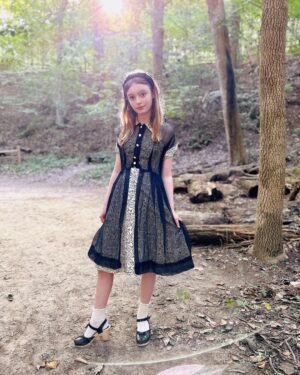 Olive Elise Abercrombie Instagram - Wedding attire from a few weeks back 🖤🤍 Amazing vintage dress from @trunkofdresses 🚲