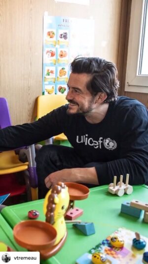 Orlando Bloom Instagram - RP: @vtremeau 

Towers We Build

@unicef Goodwill Ambassador @orlandobloom in Moldova meets refugee children fleeing the Ukraine war. Moldexpo centre, Chișinău, Moldova.

Since the start of the war on 24th February, more than 1.8 million children have fled to neighbouring countries as refugees and 2.5 million are internally displaced inside Ukraine.

During the three days trip, Bloom visited two out of three UNICEF-supported “Blue Dot” spaces in Moldova, where women and children stop for rest and support as they cross the border from Ukraine in search of safety. “The Blue Dots set up by UNICEF on the borders are a vital first stop for mothers desperately looking for some respite, and a safe place for children to play,” said Orlando Bloom.

UNICEF and UNHCR, in partnership with governments and civil society organizations, have set up three “Blue Dots” in Moldova on key refugee routes. The one-stop safe spaces provide information to traveling families, help to identify unaccompanied and separated children and ensure their protection from exploitation, and are a hub for essential services.

#vtremeau #unicef #ukraine #photojournalism