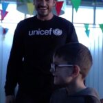 Orlando Bloom Instagram - @orlandobloom plays with Ukraine's refugee children. On his recent visit to a Blue Dot centre in Moldova, our Goodwill Ambassador played 'Tower of Fears' with children who fled war in #Ukraine. The game helps children break down their fears and manage their feelings, after enduring a traumatic journey to safety. The Blue Dot centres, operated by UNICEF, @refugees and partners provide safety and other vital services, including psychosocial support to families fleeing war. The needs of children and families in and outside Ukraine grow every day. Help by tapping the link in our bio.