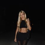 Pamela Reif Instagram - anzeige | a golden light in the dark 🪩✨ sunset light might be my favorite - but I just bought myself a flash camera 👀👀👀😂 that worked preetttttyyyy good, right? Now we got a new level of “my favorite color is black” Wearing the new @calzedonia autumn / winter tights from the recent party collection 🪩 #nightlife #backtobed #haha #calzedonia #feelgoodincalzedonia Ibiza, Spain