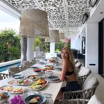 Pamela Reif Instagram - Anzeige | 10 photos of the last 5 days 🌴 we prepared the launch of @ela.beauty (5 days left for pre-access, 2 weeks for the main one 🥹) and were supeeeer motivated from sunrise till sunset. We stayed at @thewaveibiza and used every angle of this ginormous and beautiful villa 🕺🏼 Can’t wait to show you more, I’ll sort my 1200 BTS videos (really) and post bit by bit 🤓👀 PS: you’ll get lots of mama reif content soooooon👩‍👦 📍@thewaveibiza #elabeauty #elanaturalbeauty #haircare #launchingsoon #pamelareif The Wave Ibiza