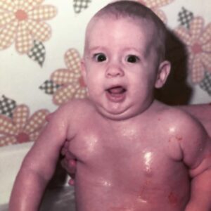 Penn Holderness Instagram - Happy Veterans day! This early double chin is from 1974. The hand propping me up belongs to my dad, who served in the US Army during the Cuban Missile crisis. Thanks for keeping me safe dad, both in the tub and in the Army! #doublechinstagram #veteransday