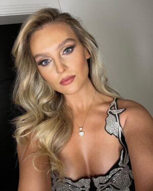 Perrie Instagram - I forgot what it feels like to dress up & dance till my feet hurt 🥹😍🖤