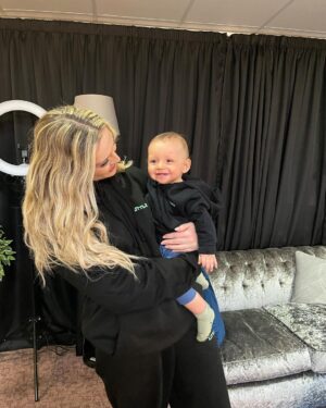 Perrie Instagram - We were in matching Little Mix tracksuits but in true baby style he shat everywhere. But here we are! Watching his first ever show 🥺😍♥️