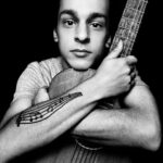 Platon Instagram - Friends, please meet Omer who fled from his country as a refugee at age 14. Omer is a dedicated musician and features in PORTRAIT OF A STRANGER. During our portrait session, I asked Omer if he ever felt like a stranger. Instantly his body language changed and I could tell he felt a little vulnerable. “I don’t know how to describe this,” he said, “it is a very bad feeling. Like there is something missing. Ok, I am not welcome. But why?” Omer continued, “I am not an enemy of anyone. I am a peaceful person. Being welcome is a big punch of hope.” Omer, I am at your service and I salute you.