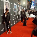 Q'orianka Kilcher Instagram - It was worth the cold windy weather to watch Bardo. 🥶 Thank you to my amazing friend and stylist @dimitryl and @regardstylehouse for this stunning “black tie seductive” tuxedo from @cristallini_official 🤵‍♀️| Earrings by @mahrukh.akuly.jewelry 🫶🏽