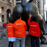 Race Wong Instagram - Standing right at the ass of the bull, we were told to touch the balls for good luck😆. After months of working round the clock, @ohmyhomesg is now listed on @nasdaq 🥳🥳🥳🥳🥳🥳! ticker OMH.