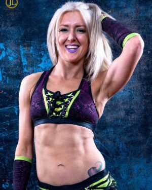 Rachel Kelvington Bostic Instagram - Classy 
Sassy 
A little smart assy 💚💜

📸 @jayleephotographyac