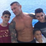 Randy Orton Instagram - I don’t think there’s any question whether or not I love you. But I could always do better showing it. I ain’t perfect, but I want you to know that my love for you is as close to perfect as your ‘mom skills’ are. Today is Mother’s Day, and I’ve never seen a better example of what it means to be ‘mom’. You are putting outfits together, making school lunches, cleaning up, doing laundry daily it seems, dinner every night, wiping asses (mine included) picking up dirty socks towels clothes etc, cleaning cleaning cleaning, driving kids to and from school/practice and yes detention (Rob), grocery shopping (still hard even though you found the app for delivery), dentist, eye dr, pediatrician, school conferences, and when it’s time for class or team moms to do their thing, look tf out, all the practices, all the games, every holiday it looks like Santa the Easter bunny, or Jack Skelington vomited in our home with all the decorations (she wins awards guys), theCovid tests for vaca’s, packing for 6 ( harder then it sounds), making every appointment for EVERYTHING..... and you somehow find the time for all of us, even though you don’t have any time for yourself. I wish I could somehow make your life easier, but when it comes down to it you are a real life super hero, and all I can do is sit back and watch....wait.... and look forward to when it’s my turn for some attention. Trust me, when I say, there’s nothing better then having you to myself, I mean it x 100. I love you, and you are the greatest mother in the entire world @kim.orton01 ❤️HAPPY MOTHERS DAY!