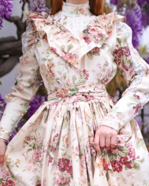 Rebecca Flint Instagram - There’s no greater thrill than wearing clothes you have sewn yourself 👗💃⁣
⁣
A few weeks ago I decided to finally make use of an old pair of vintage floral curtains 🏡⁣
⁣
Heavily inspired by 70s Prairie dresses, in particular, vintage Laura Ashley, this dress features a standing collar, lace detailed yoke with frill, leg-of-mutton sleeves with lace panels and pearl buttons, and a mighty skirt which holds more than 5 metres of length 😱⁣
⁣
There’s still things I would try and improve on if I could sew it all over again, but I’m focussing on enjoying the fruits of my labour and the peace I had when sewing it 🧘‍♀️⁣
⁣
If you sew too - tell me - do you always have the fear that for some reason it’s all going to fall apart as soon as you leave the house and be left bare? Tell me I am not alone! 🫢⁣
⁣
Thank you to @hellomissjordan for a gorgeous day out, and for helping take these photos 🌸