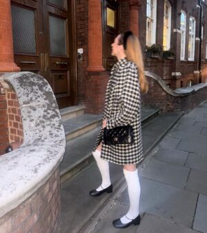 Rebecca Flint Instagram - but what are we wearing to the beatles concert at royal albert hall with live brass and strings 🗣️??

my fabulous coat is from @eyewoodwake vintage, the heat tech thermals are out in full force this chilly autumn from @uniqlo (an annual staple), I bought the velvet apron dress from japan maybe 7 years ago, the socks are also from Japan this summer, and my square toe maryjanes are @empressaustralia 🎀