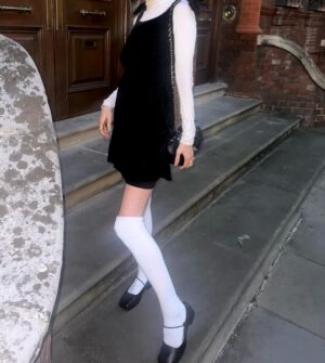 Rebecca Flint Instagram - but what are we wearing to the beatles concert at royal albert hall with live brass and strings 🗣️??

my fabulous coat is from @eyewoodwake vintage, the heat tech thermals are out in full force this chilly autumn from @uniqlo (an annual staple), I bought the velvet apron dress from japan maybe 7 years ago, the socks are also from Japan this summer, and my square toe maryjanes are @empressaustralia 🎀