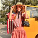 Rebecca Flint Instagram - what I wore to the classic car boot 🏎️✌️ I had been desperate to wear this incredible Gunne Sax pink dress acquired from @olive_and_quince_vintage (who I met this day also!!) Decided to accent with black so sported my SPPO hat I picked up in Japan in the summer and some bow socks of the same Finally these @empressaustralia shoes, classic square toe Mary Janes which are so incredibly comfortable 🎀 London, United Kingdom