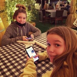 Rebecca Romijn Instagram - Held off as long as we could, fought a good fight, but they got phones.  Goodbye childhood 😔