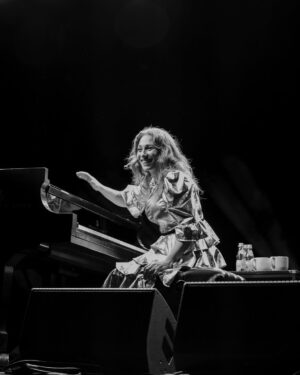Regina Spektor Instagram - Hi friends!
This is just to say that I hope you haven’t been too flooded and rained upon, that I am pondering a fun local to NYC announcement, and that if you haven’t yet signed up to my text list (USA only) or email list (world wide) then please do so… links to both in the Bio 🍂 We’ll be ready to send you the news soon ☎️✍️

Beautiful 📸 by @jennamurray from Central Park Summer Stage 
Silver 👗 by @batshevadress 

🍂🍂🍂🍂🍂💕💕💕💕💕🎶🎶🎶