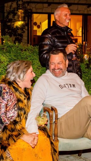 Ricki Lake Instagram - All right, friends, please indulge me for just a minute…. I have to celebrate and share. Today is our One Year Anniversary!!!!!! 
To say Ross and I have had the time of our lives this year, would be an understatement. Despite all the madness in the outside world, the chaos and uncertainty, along with the sudden loss of my beloved companion, Mama on April 26th, our little bubble has been in a state of continued bliss. Grounded euphoria, we call it.  It’s wild. How easy it can be. Okay, granted I’m writing this post a bit stoned, and feeling particularly introspective. It’s just that Ross ♥️ and I should never have met. In no way would our separate circles has collided, as we are such different people from different worlds The fact that we met through a friend (thx Gem!) during the height of a global pandemic, while I was in another relationship and he wasn’t really looking for one, our paths did cross, and it is magic. We are magic. Here we are in our mid 50’s, our 6 kids grown and out of the house and we feel like kids ourselves. Every night is a sleepover and each sunset 🌅 together on our sacred land is one to celebrate and have reverence for. 
I love sharing our story of love especially after sharing all that I’ve been through.  This relationship is really what I was looking for. After losing my beloved Christian almost 6 years ago. I honestly didn’t think I would find him. That special soul.  Well, I did. And do and I do and I do. Ross, my gentle giant, you are the best man I have ever known. I love you so much. Being your partner is one of the greatest joys of my life. You are what I have dreamed of. I have always believed in love, and kept my heart open, experienced great love and yet, this one is so so different.  Next level. Maybe it’s because we both really love ourselves and know we deserve it. 
Happy Anniversary my love! 
♥️🌅✨♥️
