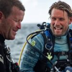 Riley Elliott Instagram - So I told @abc4explore "mate sorry forgot to tell you, we are about to dive with tiger sharks in a place where no one has intentially done so before, and there's more under there than any place on earth, and there a massive food source that has them all super competitive" He said "come on mate I've done 85 or something shark weeks, nothing can be new to me" Neither of us said this but there is some truth in the statements @sharkweek starts in just five days time!!!!! Tune into @discovery on the 29th July for #sharksofheadstonehell to see what we got ourselves into