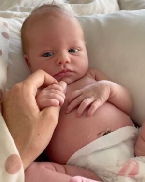 Riley Elliott Instagram - So we had a baby girl!!!! 
✨ Sailor Jane Elliott ✨ 
Born 3rd October, 3.3kg. 
I’ve held baby sharks before, a few human ones here and there, but never have I experienced something quite like this. After an amazing labour by Amber, where she did 3/4 of the labour at home, we were surrounded by the most incredible team of women at North Shore Hospital. I was instructed by our midwife to catch my very own baby girl as she came into the world. From her very first moment in this world she was eyes open, super inquisitive and has been a dream so far, peacefully observing her new world with us. 
She’s already been in the water with Great Whites for Shark Week (inside mummy), has a wolf for a brother, and will likely live a very oceanic life. Lots of love little Sailor. And Amber, I am and always will be blown away by your strength and beauty xxx