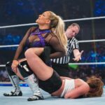 Ronda Rousey Instagram - Gotta give it to @shotziwwe, - though I’m missing a chunk out of my cheek from that manicured fishhook - at least she had the gumption to come at me head on. Whereas there’s friends for a reason, friends for a season and then there’s this bitch @natbynature - btw I still think Uncle Bret does the sharpshooter better than you 🖕🏼