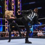 Ronda Rousey Instagram - Let’s take a second to appreciate those braids by @thisisbabe, makeup by @mariko_hirano and those aptly named @prada #monolith boots- here’s @charlottewwe fully appreciating one of the boots