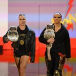 Ronda Rousey Instagram - Damn we look good in gold @qosbaszler 🥇🥇 And my hair is a special kind of fantastic while cranking on @katana_wwe’s arm 💇🏼‍♀️thank you @thisisbabe ! #TagTeamChamps #AndStill