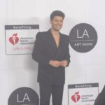 Ronen Rubinstein Instagram - @LAArtShow x @American_Heart ❤️ #StyledByChaise Head to Toe @YSL 💎 @VraiOfficial Vintage @JaegerLeCoultre Grooming @SRollerTaylor