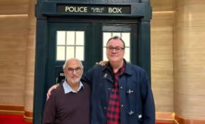 Russell T Davies Instagram - Happy New Year’s Eve! And the point is - there, right behind us, that’s one of the sets from the Christmas 2024 episode of Doctor Who! The future! Right there ♥️ But what terrible secrets does it hide..? (etc) @bbcdoctorwho @bbcone @bbciplayer @disneyplus #2024