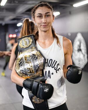 Sabina Mazo Instagram - Our newest @lfafighting champion just got home with her belt and is already back in training. We have more camps and more victories to get after, and she’s not the kind of girl to sit out when there is work to be done.
There’s no one who deserves this belt more than @sabinamazo 

Congratulations champ.

📸: @emilsmarie 
______________________________
Nossa mais nova campeã @Ifafighting acabou de chegar em casa com seu cinturão e já está de volta aos treinos. Temos mais acampamentos e vitórias para buscar, e ela não é o tipo de garota que fica de fora quando há trabalho a ser feito.
Não existe ninguém que mereça mais esse cinturão do que @sabinamazo.

Parabéns, campeã.
‌
#BlackHouseMMA #LFAfighting #LFAchampion #flyweightchamption #womensflyweight #125champion #worldchampion #championshipbelt #fightlikeagirl #womenwhofight #girlfighter #muaythai #boxing #combatsports #mma #mmagym #wrestling