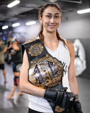 Sabina Mazo Instagram - Our newest @lfafighting champion just got home with her belt and is already back in training. We have more camps and more victories to get after, and she’s not the kind of girl to sit out when there is work to be done.
There’s no one who deserves this belt more than @sabinamazo 

Congratulations champ.

📸: @emilsmarie 
______________________________
Nossa mais nova campeã @Ifafighting acabou de chegar em casa com seu cinturão e já está de volta aos treinos. Temos mais acampamentos e vitórias para buscar, e ela não é o tipo de garota que fica de fora quando há trabalho a ser feito.
Não existe ninguém que mereça mais esse cinturão do que @sabinamazo.

Parabéns, campeã.
‌
#BlackHouseMMA #LFAfighting #LFAchampion #flyweightchamption #womensflyweight #125champion #worldchampion #championshipbelt #fightlikeagirl #womenwhofight #girlfighter #muaythai #boxing #combatsports #mma #mmagym #wrestling