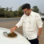 Sachin Sanghvi Instagram – I love road travel on a #gig day …… especially if it’s full of gujju pleasantries on the way! 
My Gujju fans, any guesses what I am eating …..
P.s:  clue – near Vapi 
#giglife #lifeontheroad #gujarat
