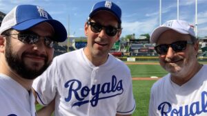 Samm Levine Instagram - The 2019 @bigslickkc shenanigans have begun! This year’s softball game at the @kcroyals Kauffman Stadium was one for the ages! Please enjoy this photo series from the day #BigSlickKC
.
1) Two and a half Jews
2) A Modern Family reunion with @ericstonestreet & @arielwinter 
3) After his walk off victory hit, Antman gets hoisted onto the shoulders of @tarzannoz & @kevinpollak123, while Shazam refuses to help 
4) Moments after umpire Bruce Dreckman drilled me in the head with an unannounced toss into the dugout suite. He was kind enough to check on me and make sure I wasn’t going to sue
5) A musical interlude brought to you by @zacharylevi & @tarzannoz (I should know this one better)